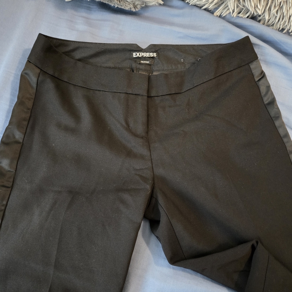 Express ColumnistSize : 2 short Black with polyester strip down the side of th